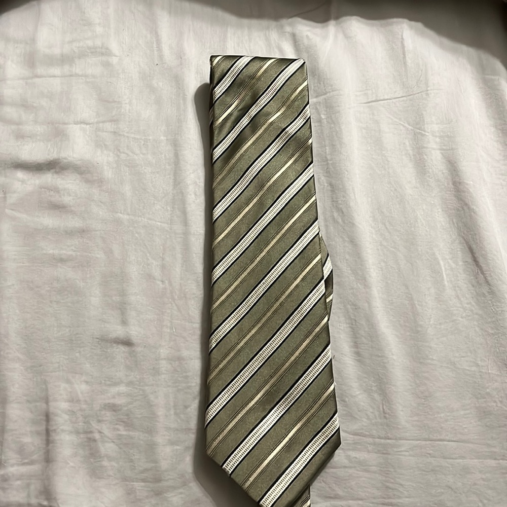 This tie is green and cream stripped pattern